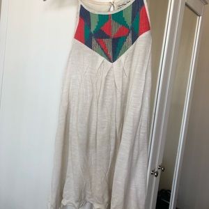 White loose tank top with colorful upper detailing